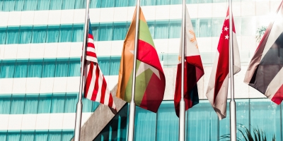five flags in front of an office building