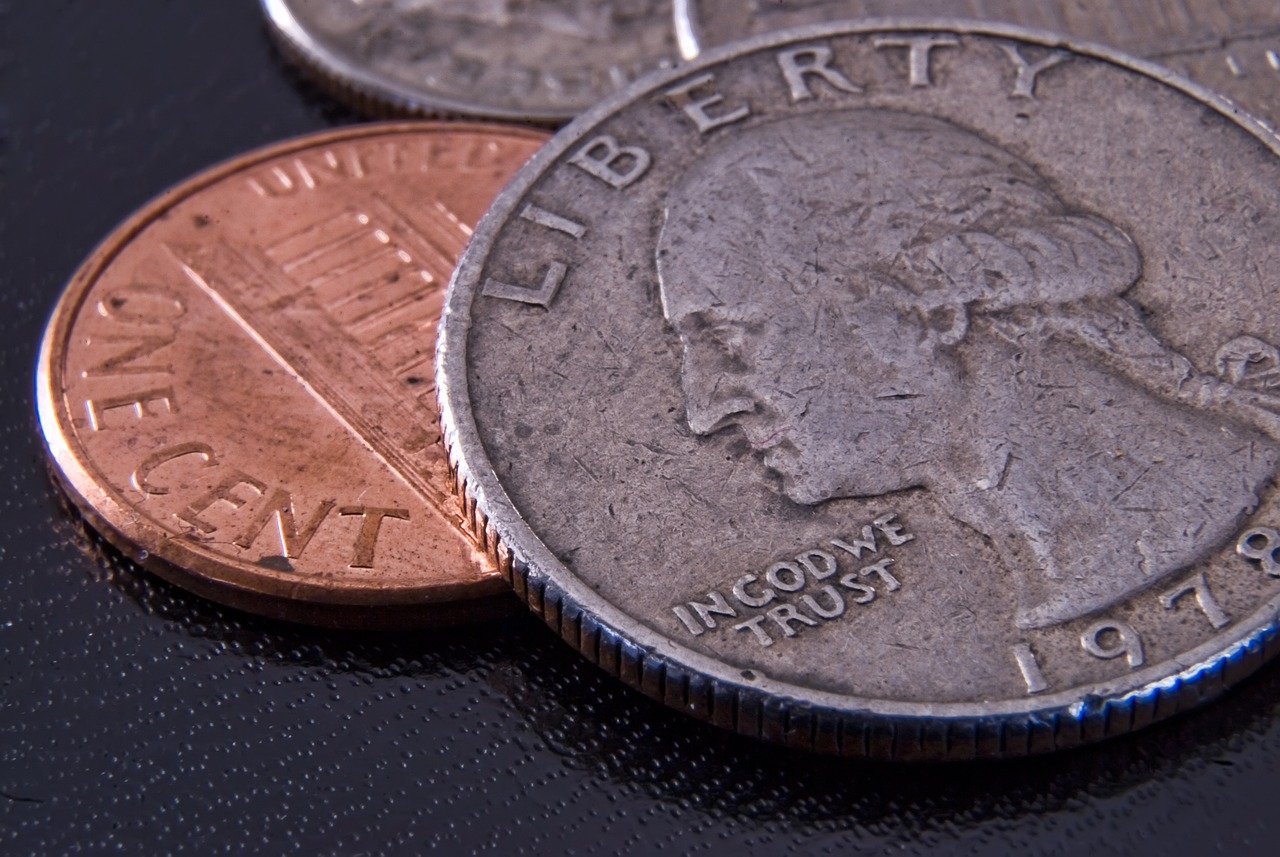 closeup photo of a small pile of U.S. coins