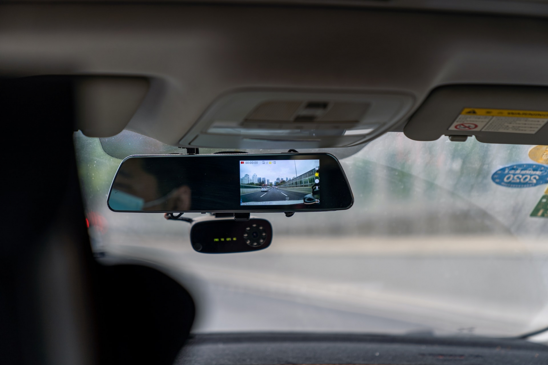 Rearview mirror with dashcam display.