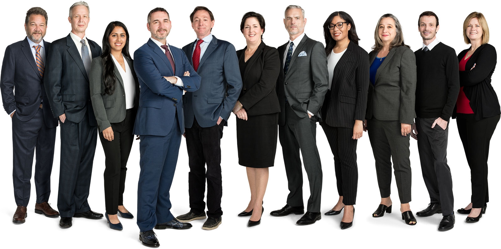 Eleven people wearing business suits, standing in a line, shoulder to shoulder