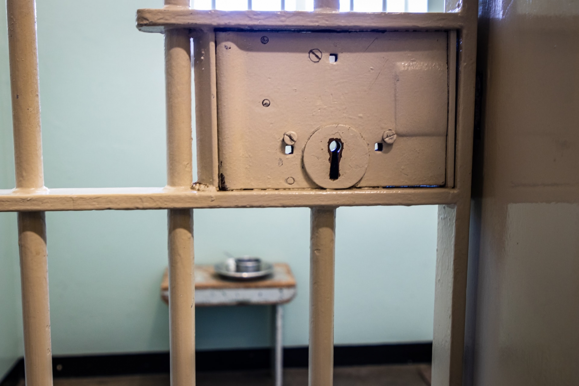 Photo of a jail cell door