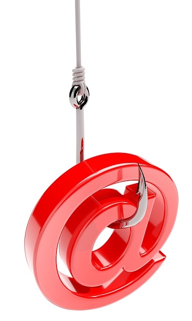 A red, shiny "at" symbol, hanging from a large metal fishhook