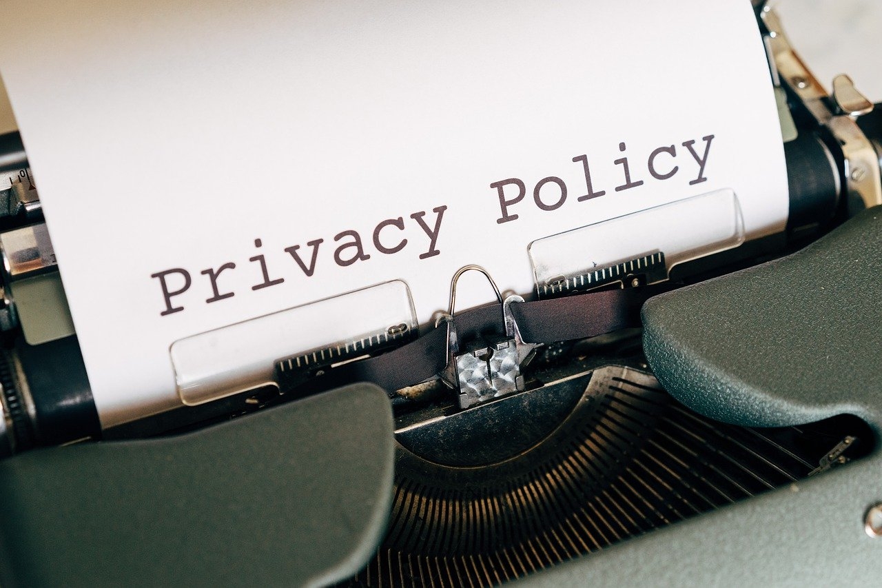 Photo of a typewriter with the words Privacy Policy typed on the sheet of paper