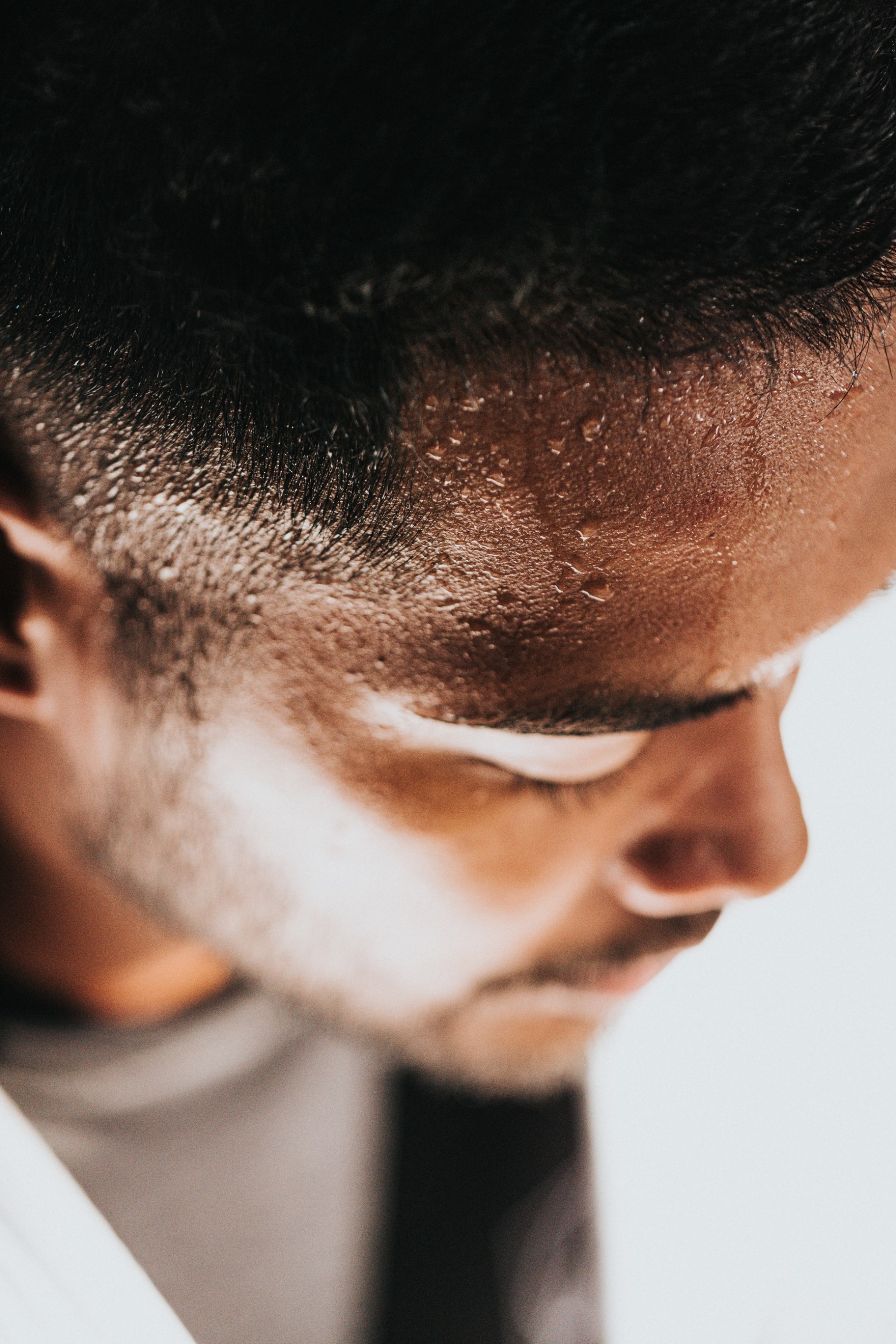 Photo of a black man's sweaty head