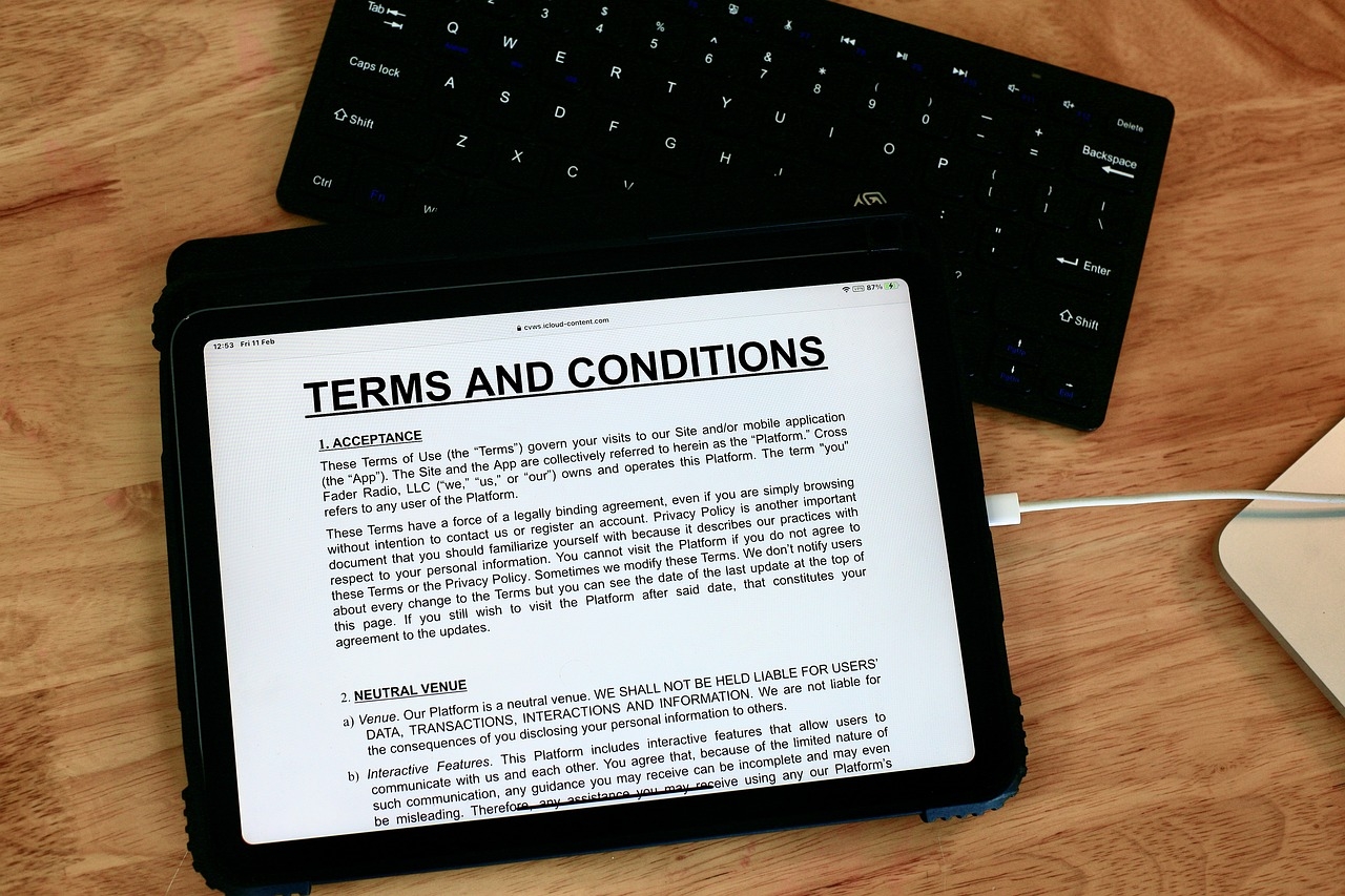iPad displaying a page of text, with the heading terms and conditions