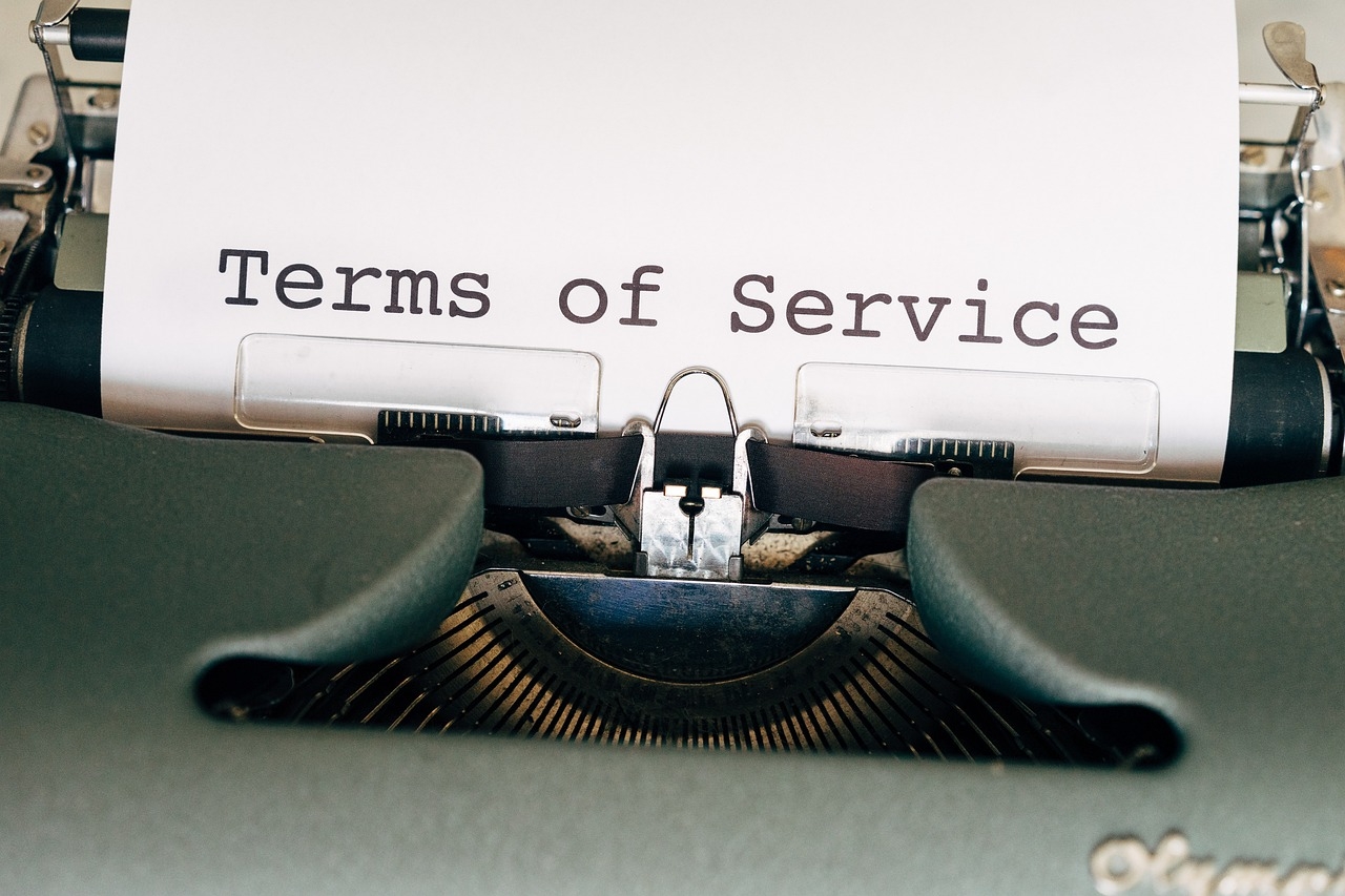 Paper in a typewriter, with the words Terms of Service